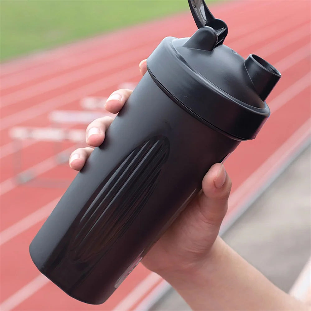 Portable Protein Shaker Bottle – 600ml with Wire Whisk for Gym & Outdoor Fitness